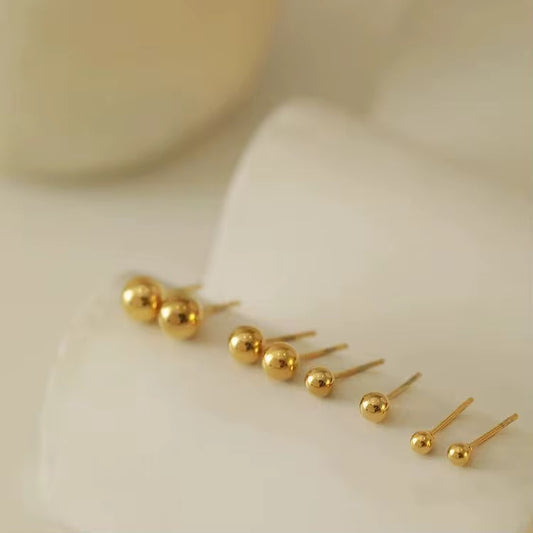 A trio of stud Earrings